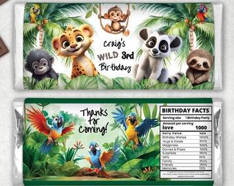 May include: Two chocolate bar wrappers with jungle-themed designs. One features cartoon animals and text that reads "Craig's WILD 3rd Birthday." The other says "Thanks for coming!" with parrots and a "Birthday Facts" label.