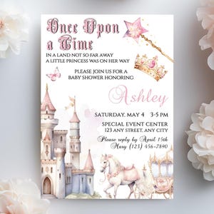 May include: A baby shower invitation with a fairytale theme. The invitation features a watercolor illustration of a castle, a horse-drawn carriage, and a magic wand. The text reads "Once Upon a Time" and invites guests to celebrate Ashley.