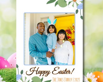 May include: A Happy Easter greeting card with a floral border and a photo of a family of three standing in front of a yellow door. The text on the card reads "Happy Easter! The Jones Family | 2025".