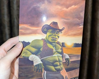 May include: A green ogre wearing a cowboy hat and vest, with a sunset in the background. The ogre is standing in a field with a wooden fence.