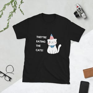 They&#39;re Eating the Cats! Short-Sleeve Unisex T-Shirt, 2024 Presidential Debate Quote, Trump Political Gift