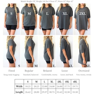 May include: A size fit guide for Comfort Colors 1717 t-shirts, featuring front and side views of sizes S through 2XL. Includes a model height of 5'8", weight of 145 lbs, chest 37", waist 32", hips 42", and a table with width, length, and sleeve measurements.