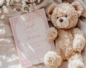 May include: A pink and white baby shower invitation with a decorative border. The invitation reads "Cielito Lindo" and includes the name "Amarai", the date "10 Diciembre 2024", and the time "5:00 pm".