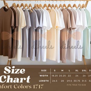 May include: Size chart for Comfort Colors 1717 t-shirts, showing measurements in inches for width and length in sizes S through 4XL. The chart shows the t-shirts are available in brown, beige, white, gray, light blue, and light green.