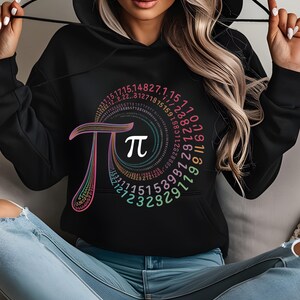 May include: Black hoodie with a colorful graphic of the mathematical constant pi, featuring a spiral of numbers.