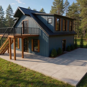 May include: A two-story blue-green house with a black roof and wooden accents. The house has a balcony with black railings and a wooden staircase. The house is surrounded by trees and a concrete patio.