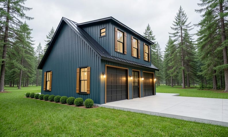 May include: A two-story, dark teal-colored building with a black roof and garage doors. The building has wooden shutters and trim, and is surrounded by green grass and tall pine trees. The building has two garage doors and a door.