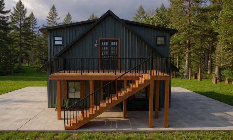 May include: A modern, two-story cabin with a dark teal exterior and a wooden deck. The cabin features a black railing, a wooden staircase, and a concrete patio. The surrounding area is filled with green grass and tall trees.