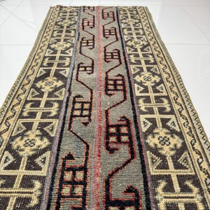 2x11 Charcoal And Beige Vintage Turkish Runner Rug With Rustic Geometric Wool Pattern