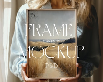 DIN A Frame Mockup With Person (PSD)