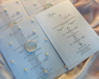 Embossed Pearl White Invitation Envelope: Elegant Black Print