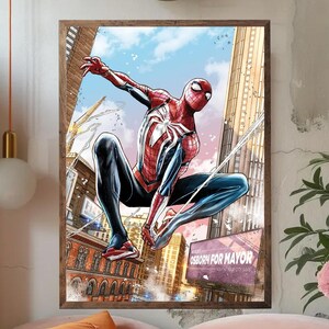 May include: A framed comic book art print featuring Spider-Man in a dynamic pose, swinging through a city. The superhero is clad in a red and blue suit, with a white spider emblem. Buildings and a billboard with the text "OSBORN FOR MAYOR" are visible.