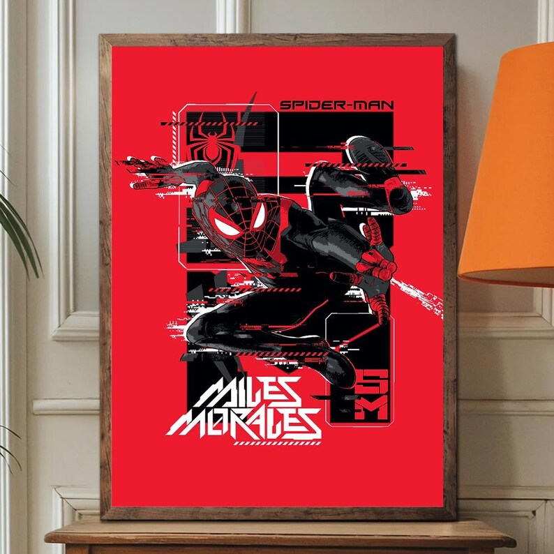 May include: Framed poster of Miles Morales, Spider-Man, in a dynamic pose. The artwork is red and black, with a glitch-like design. The character's suit and background elements are stylized. The words "SPIDER-MAN" and "MILES MORALES" are prominently displayed on the poster.