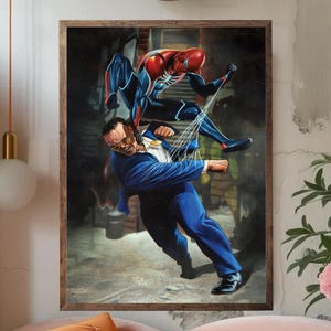 May include: Framed artwork featuring a dynamic scene of Spider-Man in action, battling a man in a blue suit. The artwork showcases vibrant colors and detailed character poses, set against a gritty urban backdrop.
