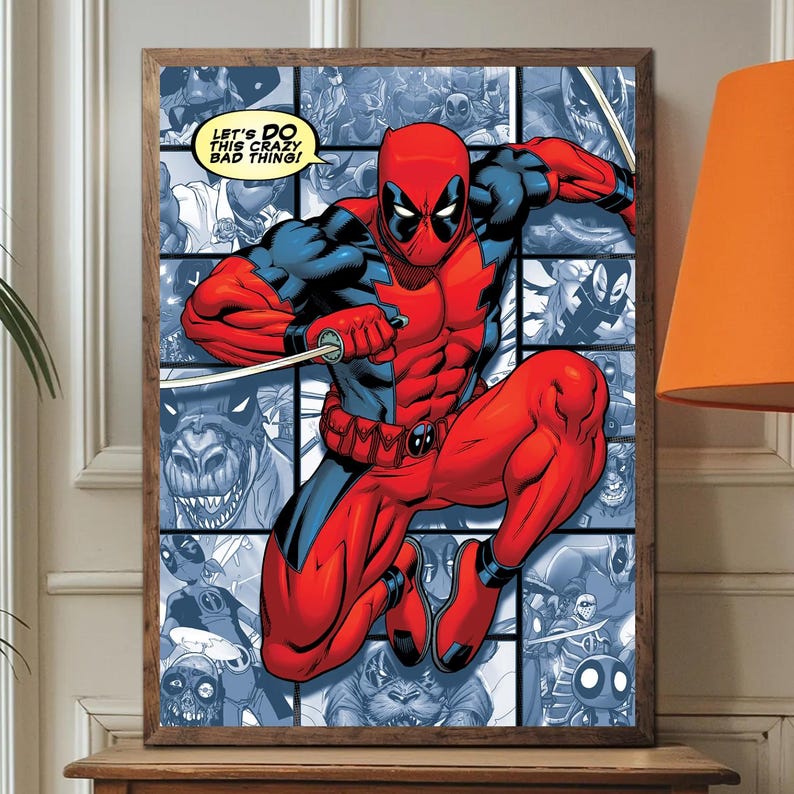 May include: A framed comic book art print featuring Deadpool in a dynamic pose, clad in a red and black suit, holding swords. The background is a collage of comic book panels. Text in a yellow speech bubble reads, "Let's do this crazy bad thing!"
