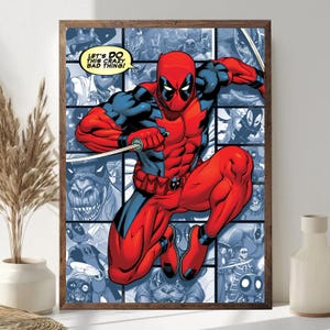 May include: Framed comic book art featuring Deadpool in a dynamic pose, clad in a red and black suit, holding a sword. The background is a collage of comic panels in shades of blue. Text in a yellow speech bubble reads, "LET'S DO THIS CRAZY BAD THING!"