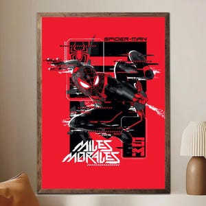 May include: A framed art print of Spider-Man in a dynamic pose against a red backdrop. The artwork uses a black and red colour scheme, with the words "SPIDER-MAN" and "MILES MORALES" in white, creating a striking visual.