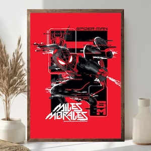 May include: Framed art print of Spider-Man in a dynamic pose against a red background. The artwork includes the text "SPIDER-MAN" and "MILES MORALES" in white, along with graphic elements. The print is in a wooden frame.