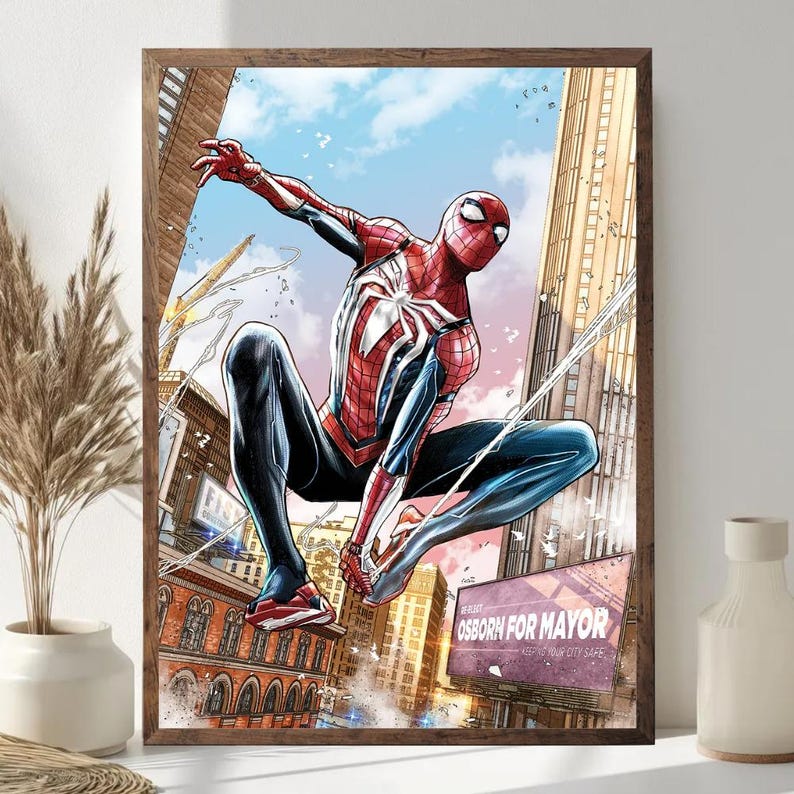 May include: Framed comic art print of Spider-Man in a dynamic pose, set against a cityscape backdrop. The superhero is clad in a red and blue suit, with web lines extending from his hands. The print is in a wooden frame.