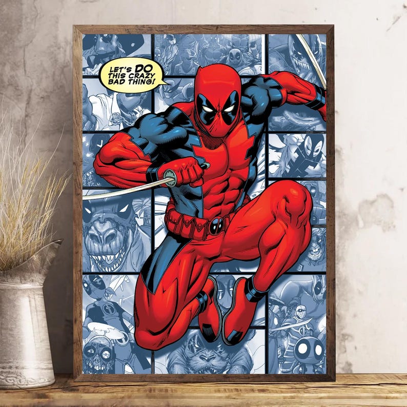 May include: A framed comic book art print featuring Deadpool in a dynamic pose, clad in a red and black suit. The background is a collage of comic panels in shades of blue. Text in the image reads, "LET'S DO THIS CRAZY BAD THING!"