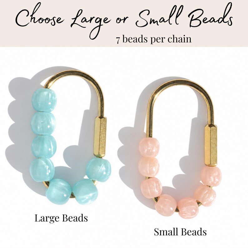 May include: Two oval gold-tone metal chains, each featuring seven beads. The left chain has light blue beads labeled Large Beads, and the right chain has light pink beads labeled Small Beads. Text at the top reads Choose Large or Small Beads.