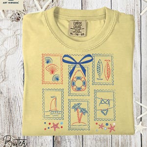 T-shirt Coastal Comfort Colors®, chemise carte postale de plage, t-shirt à imprimé coquillages, chemise cachet rétro, t-shirt Coastal Stamp, chemise côtière Coquette