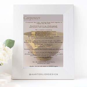 May include: A white framed print with a beige background and gold text. The text reads "Carpenter" and includes a poem about the carpenter as a metaphor for Jesus. The poem includes the words "valuable", "vessel", "creator", "reshape", "carpenter", "lover", and "whole". The print is signed "@AARTERLIERDESIGN".