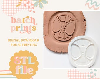 May include: A white 3D printing mold and a clay impression of a superhero mask. The image also includes the text "batch prints", "DIGITAL DOWNLOAD FOR 3D PRINTING", and "STL file" in a playful font, set against a pastel background.