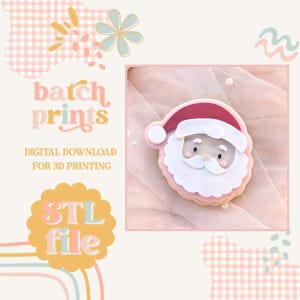 May include: A Santa Claus-shaped cookie with a red hat and white beard, set against a pink background. The image includes text that reads "batch prints" and "STL file," indicating a digital download for 3D printing.