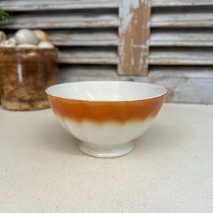 Antique French cafe au lait bowl with ribbed sides and orange band.