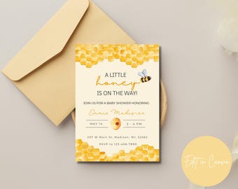 May include: A yellow and white baby shower invitation with a honeycomb pattern and a bee. The text reads "A little honey is on the way!" and includes the name "Jamie Madiver", the date "May 14", the time "2-4 PM", the address "207 W Main St. Madison, WI, 52562", and the RSVP number "123-456-7890".
