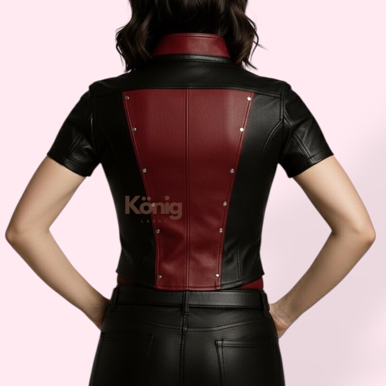 May include: Black and red leather jacket with short sleeves. The back of the jacket features a red panel down the centre, accented with silver studs. The brand name "K&ouml;nig Leder" is visible on the lower back.