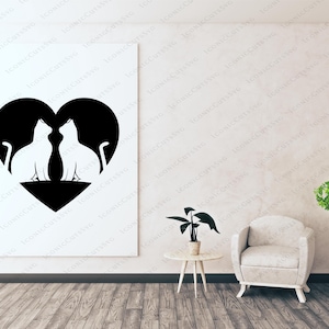 May include: Black silhouette of two cats inside a heart shape. The cats are facing each other and their tails are intertwined. The heart is on a white background.