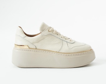 Nica beige casual damessneakers van echt leer