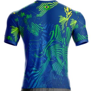 K&ouml;nnte beinhalten: Ein Set aus drei Keramikbechern mit einer gesprenkelten, cremefarbenen Glasur. Jeder Becher hat ein handgemaltes Blumendesign in Blau-, Gr&uuml;n- und Gelbt&ouml;nen. Die Becher haben eine einfache, abgerundete Form.