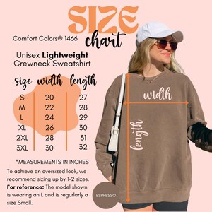 May include: A size chart for a unisex lightweight crewneck sweatshirt in espresso. The chart shows measurements in inches for sizes S to 3XL, with width ranging from 20 to 30 inches and length from 27 to 32 inches. The text also recommends sizing up for an oversized look.