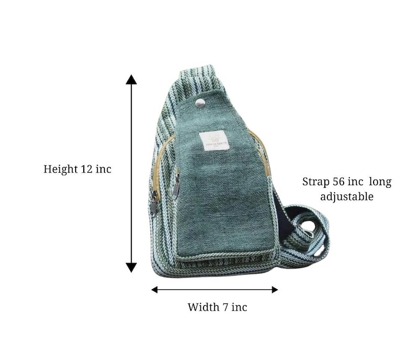 May include: A teal and green sling bag with a zippered front pocket. The bag is 12 inches high, 7 inches wide, and has an adjustable 56-inch strap. The bag has a button closure and a small label.