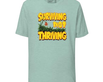 T-shirt Surviving Not Thriving: grappig 100% katoenen T-shirt voor geestelijke gezondheid