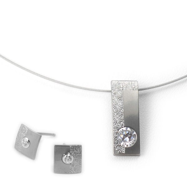 Titanium jewellery set. Allergy free! Available in 5 colours.