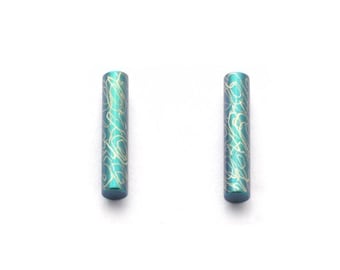 Titanium earstuds, no allergies! Available in different colours