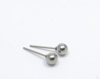 Titanium earstuds, no allergies! Available in different colours