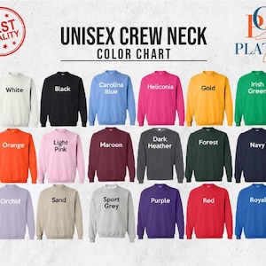 May include: Color chart for unisex crew neck sweatshirts.  The chart shows 18 different colors, including white, black, Carolina blue, heliconia, gold, Irish green, orange, light pink, maroon, dark heather, forest, navy, orchid, sand, sport grey, purple, red, and royal.