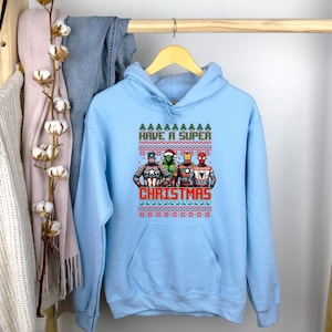 Super Christmas Characters Sweatshirt, Christmas Hero Shirt, Merry Christmas Shirt, Superhero Christmas, Ugly Sweater Christmas Hoodie