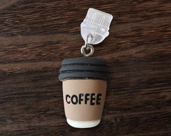 Tapón antipolvo con dije de café