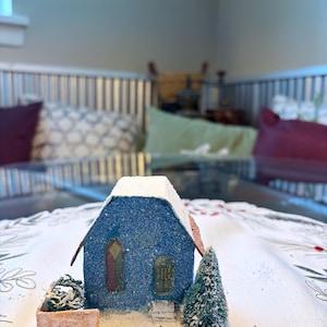 La pequeña casa de purpurina de Putz