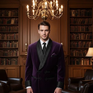 May include: A formal purple velvet jacket with black quilted lapels and cuffs. The jacket features decorative black buttons and a pocket square. The person is wearing a white dress shirt and black tie. The background includes a library with bookshelves and a chandelier.