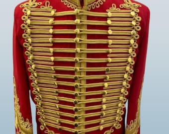 May include: A red jacket with gold trim and buttons. The jacket has a stand-up collar and a row of gold buttons down the front.