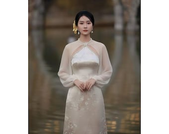 Ao Dai Women Tet Modern Design Sheer Silk Sleeves Brocade Bodice Beige Vietnamese Traditional Dress With Pearl Round Neck Detail