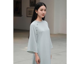 Vestido vietnamita moderno y elegante de brocado de seda color menta, estilo Tet, con detalle de botones en el cuello, ideal para la ceremonia del Año Nuevo Lunar, fiestas y sesiones de fotos.