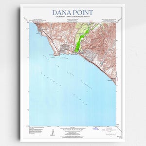 May include: A vintage map of Dana Point, California, printed by the U.S. Geological Survey. The map shows the coastline, roads, and terrain features of the area. The map is printed in shades of brown, green, and blue.